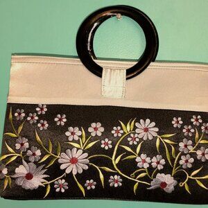 Black floral clutch circular handle